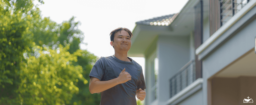 HHRC-Asian man are jogging in the neighborhood for daily health and well being, both physical and mental and simple antidote to daily